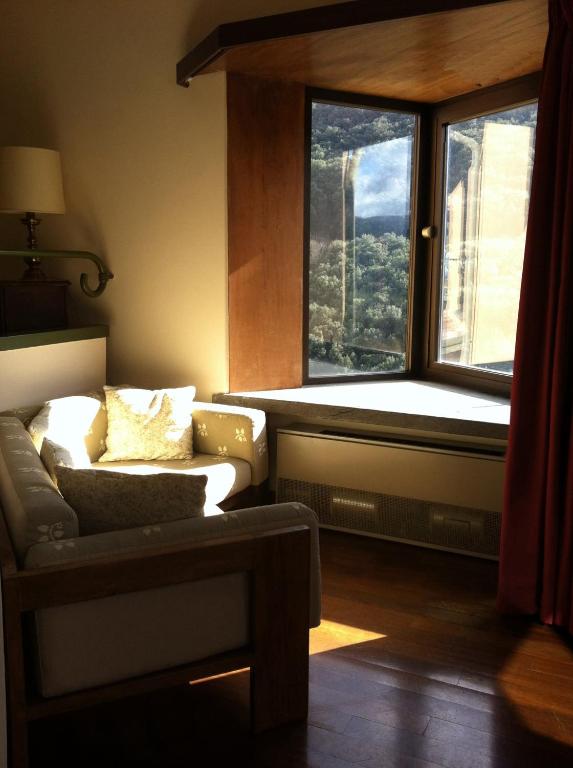 Posezení v ubytování Hotel Gattapone