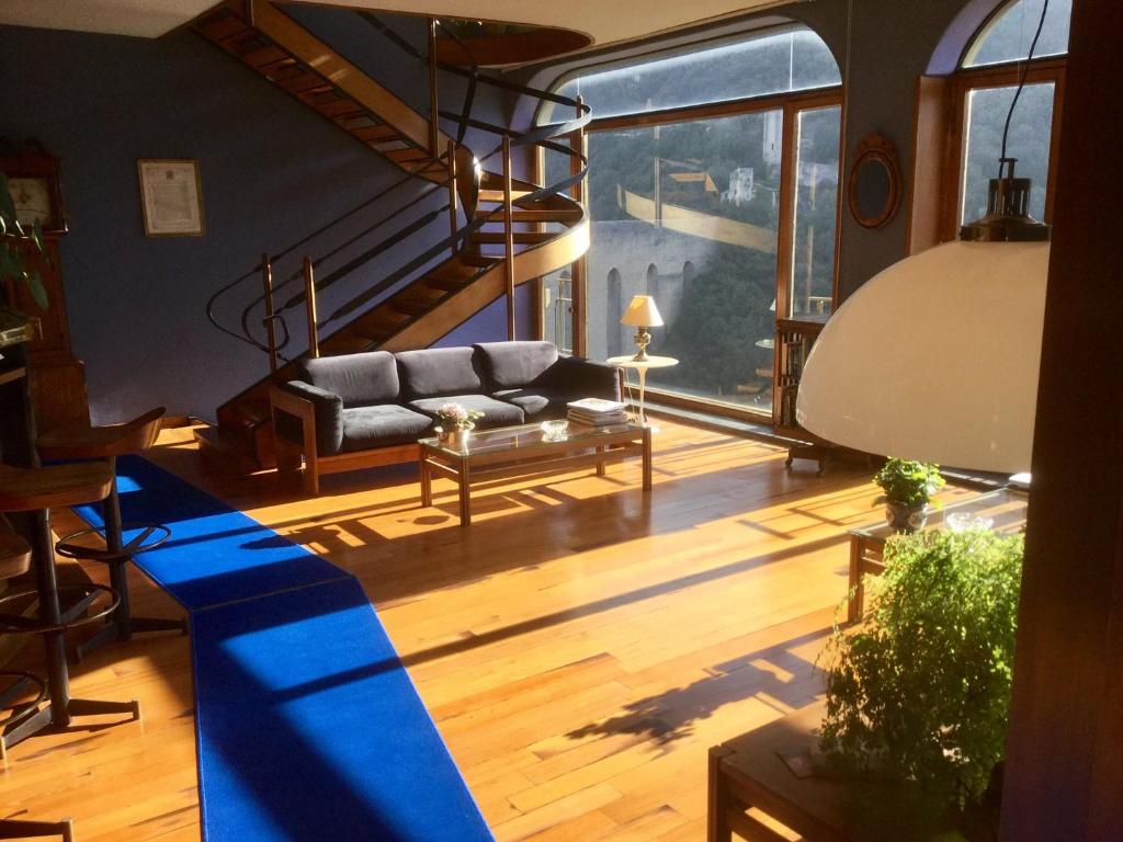 Posezení v ubytování Hotel Gattapone