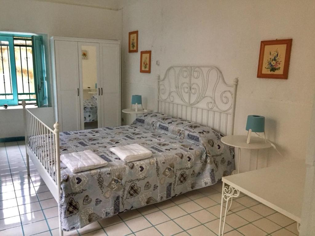 Postel nebo postele na pokoji v ubytování Le Chiazzette