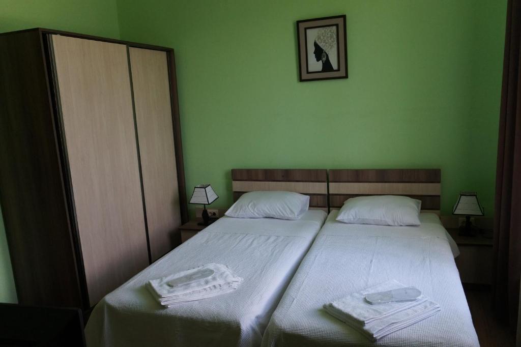 Postel nebo postele na pokoji v ubytování Villa Qero