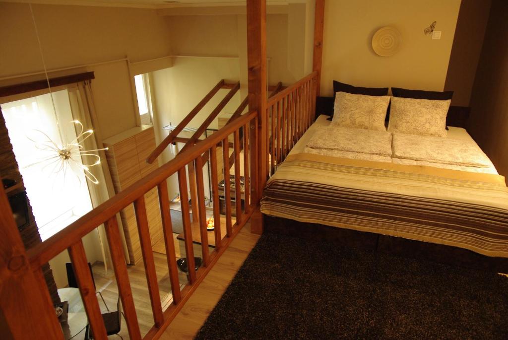Novak Apartment tesisinde bir odada yatak veya yataklar