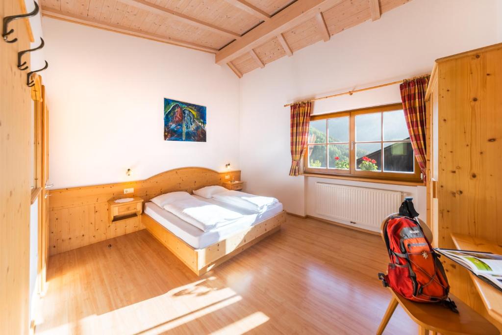 Postel nebo postele na pokoji v ubytování Pardellerhof Lüsen