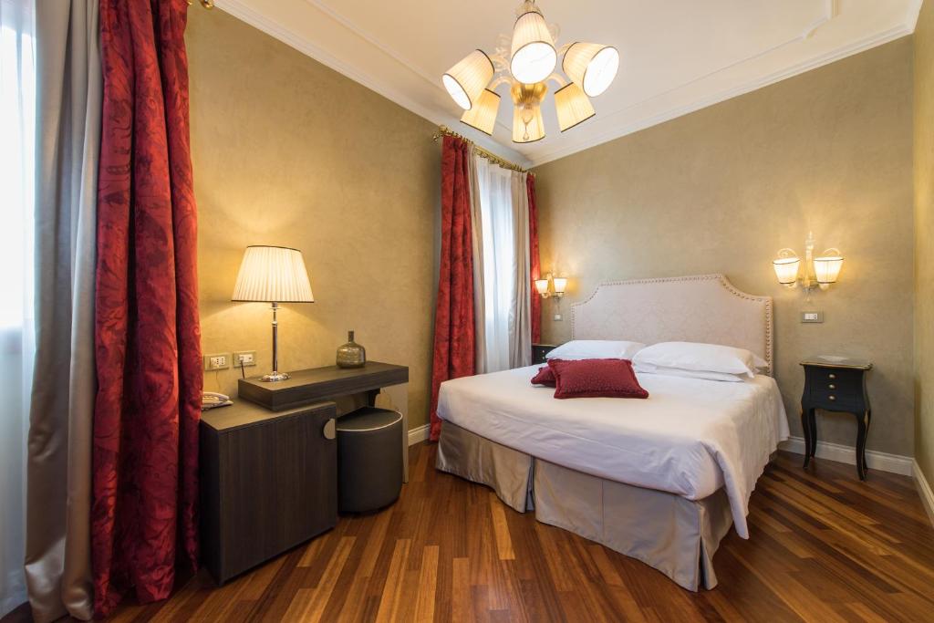 Postel nebo postele na pokoji v ubytování Hotel Campiello