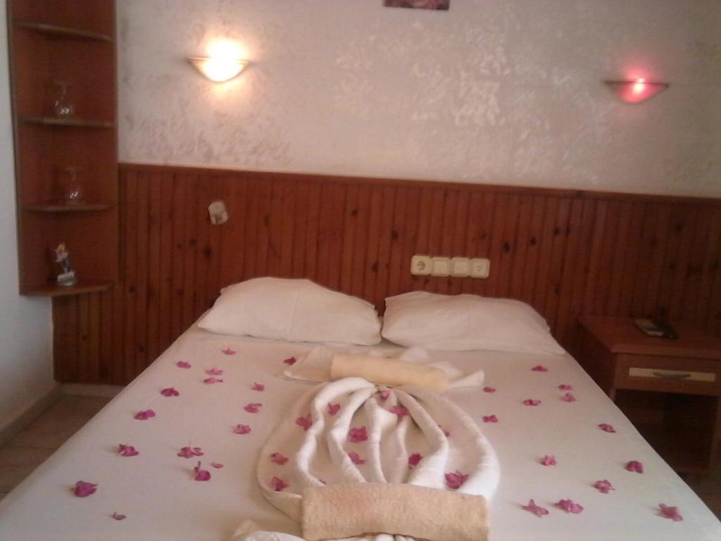 Postel nebo postele na pokoji v ubytování Latino Hotel