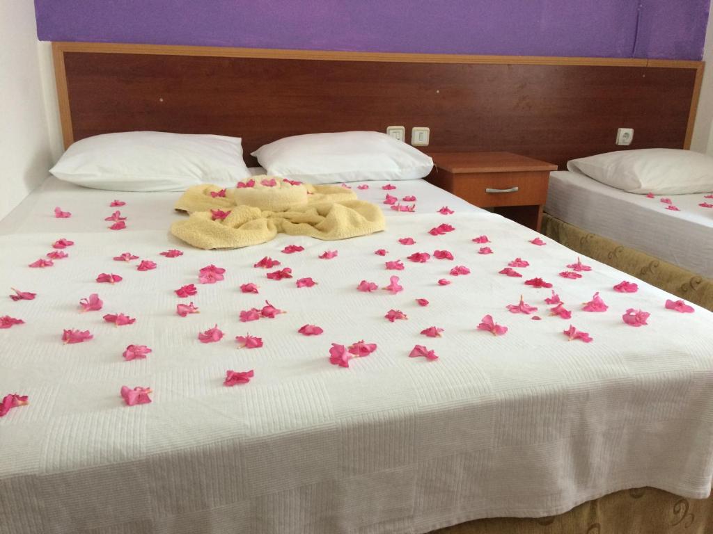 Postel nebo postele na pokoji v ubytování Latino Hotel