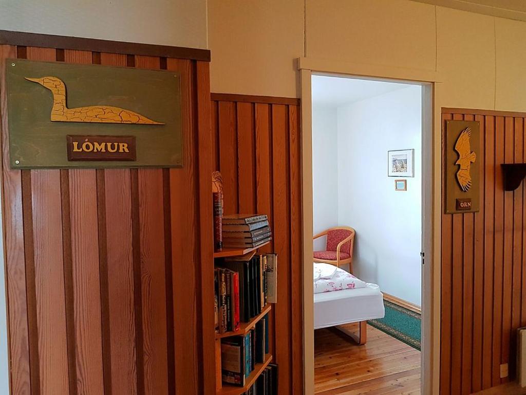 Postel nebo postele na pokoji v ubytování Hótel Bjarkalundur