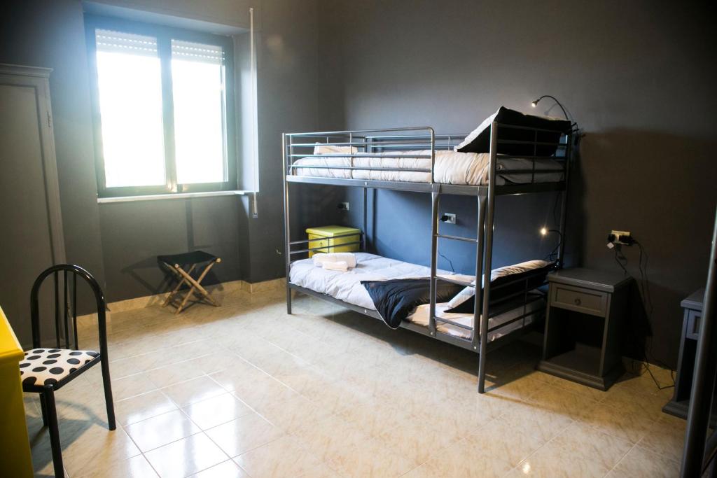 Postel nebo postele na pokoji v ubytování Lako Hostel