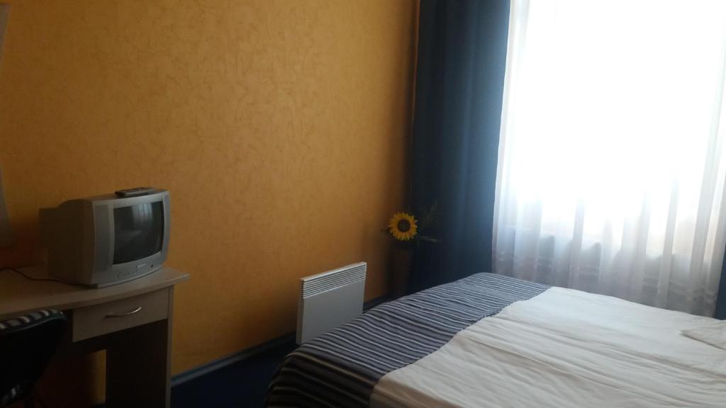Postel nebo postele na pokoji v ubytování Hotel Perfect