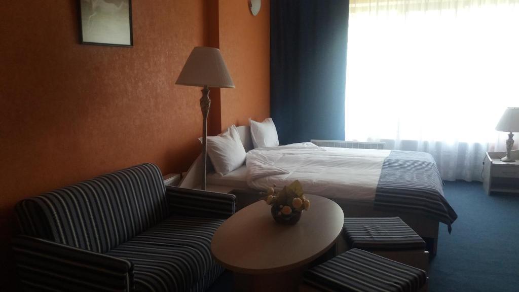 Postel nebo postele na pokoji v ubytování Hotel Perfect