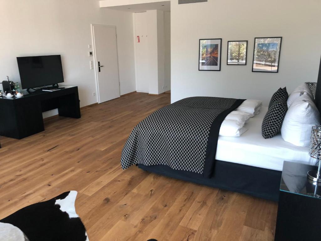 Postel nebo postele na pokoji v ubytování Voss Villa