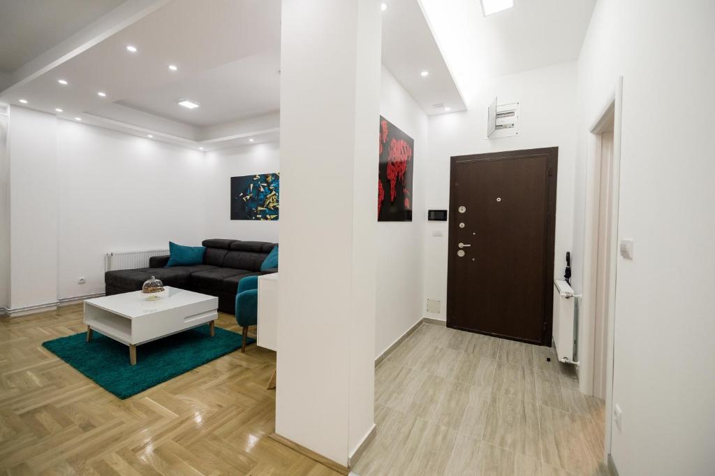 Postel nebo postele na pokoji v ubytování CENTAR Lux