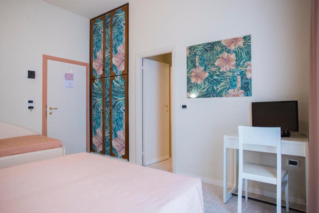 Postel nebo postele na pokoji v ubytování Sirena Boutique Hotel