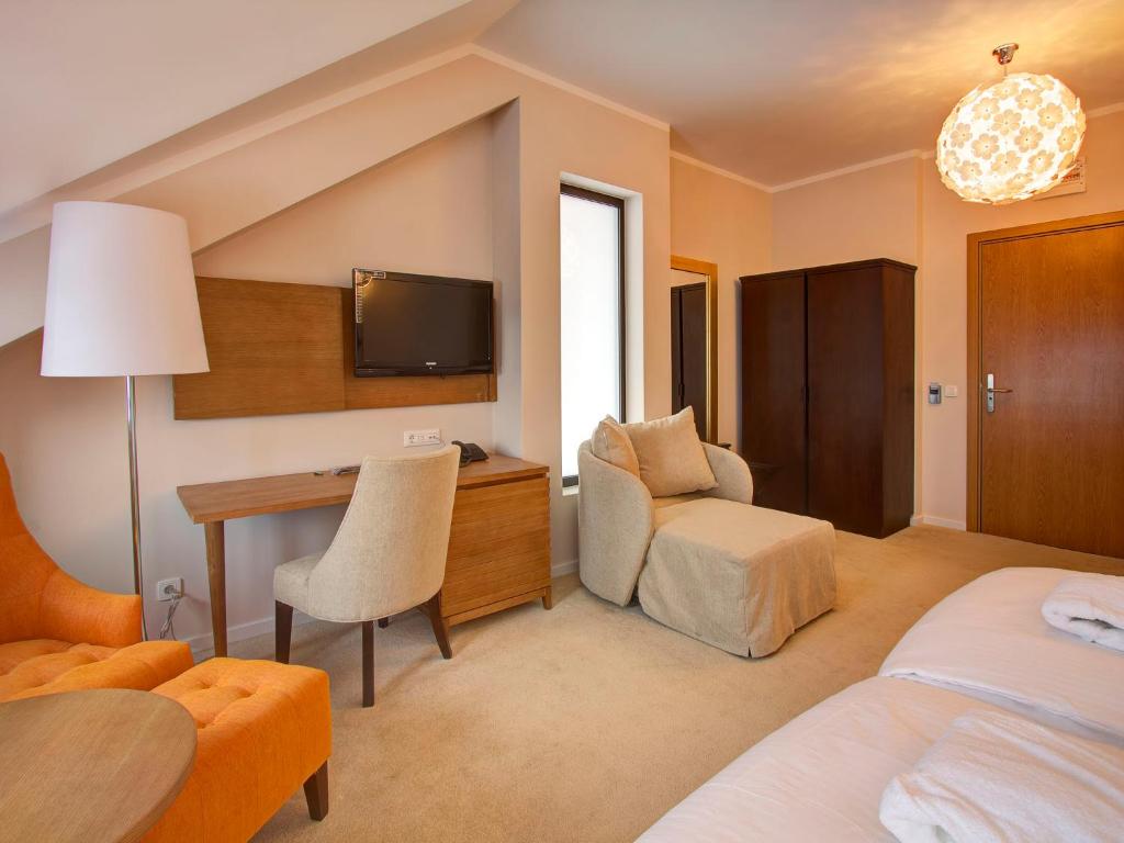 Postel nebo postele na pokoji v ubytování Hotel MIR