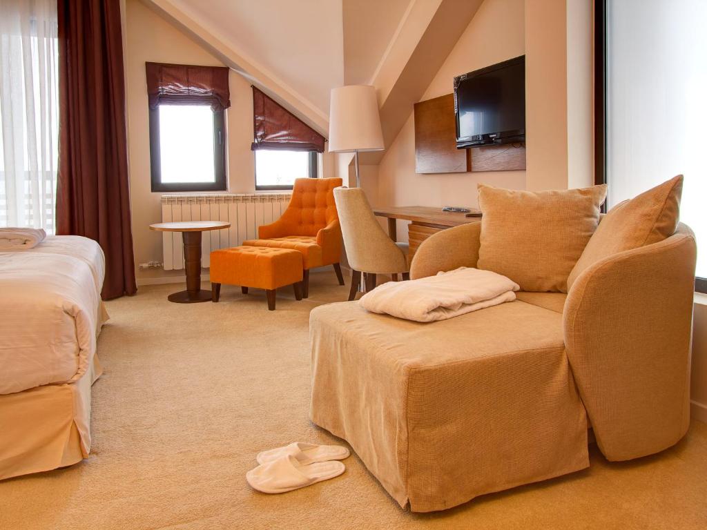 Postel nebo postele na pokoji v ubytování Hotel MIR