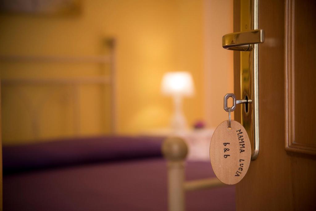 Postel nebo postele na pokoji v ubytování Mamma Lucia