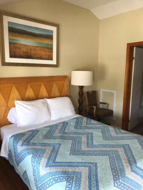 Postel nebo postele na pokoji v ubytování Avon Motel