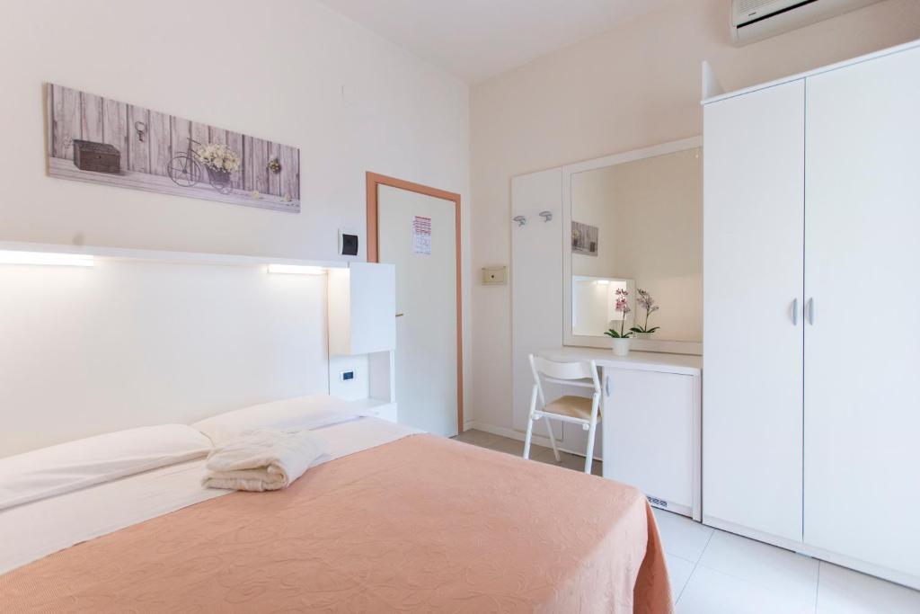 Postel nebo postele na pokoji v ubytování Sirena Boutique Hotel