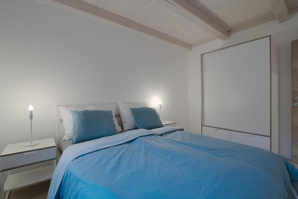 Posteľ alebo postele v izbe v ubytovaní Apartment Kuk