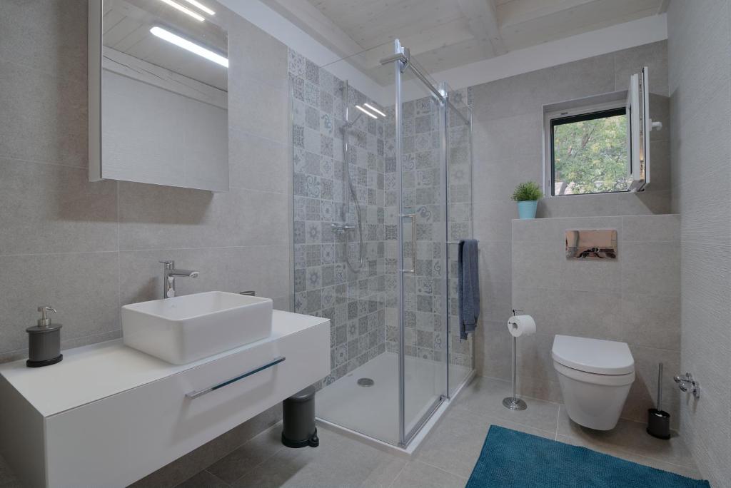 Kúpeľňa v ubytovaní Apartment Kuk