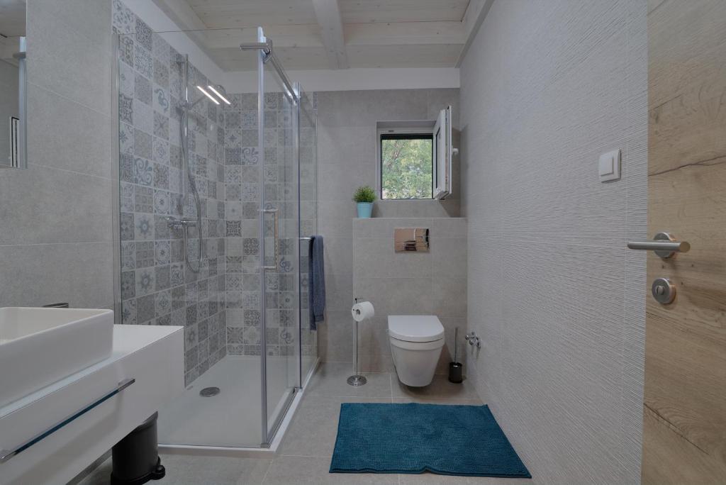 Kúpeľňa v ubytovaní Apartment Kuk