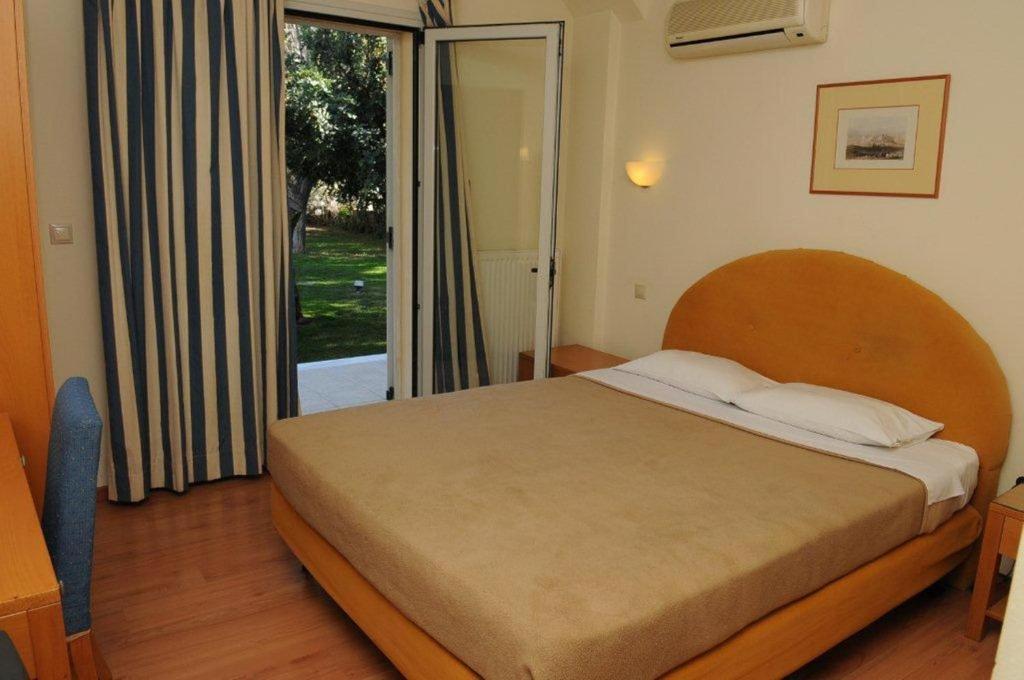 Posteľ alebo postele v izbe v ubytovaní Hotel Pantheon