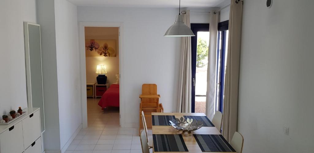 Posedenie v ubytovaní Apartamento junto a la playa. Corralejo