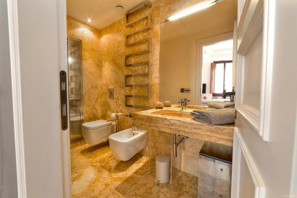 Kúpeľňa v ubytovaní Suite Deluxe Florence