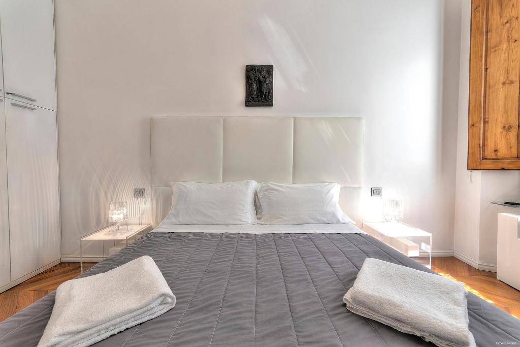 Posteľ alebo postele v izbe v ubytovaní Suite Deluxe Florence