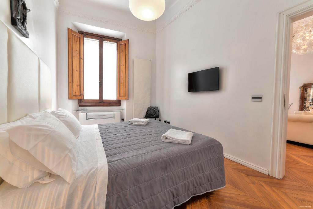 Posteľ alebo postele v izbe v ubytovaní Suite Deluxe Florence