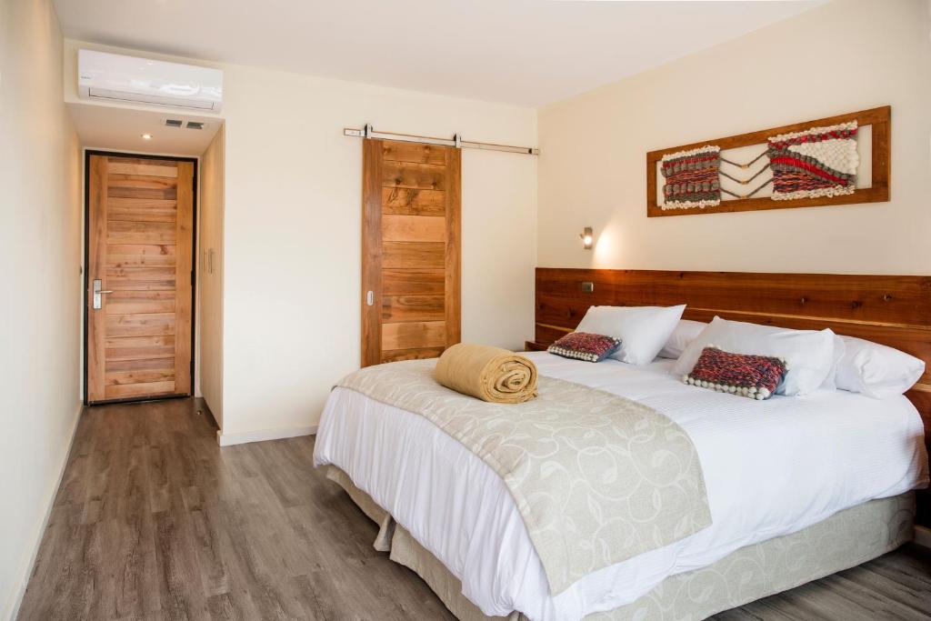 Cama o camas de una habitación en Maki Hotel