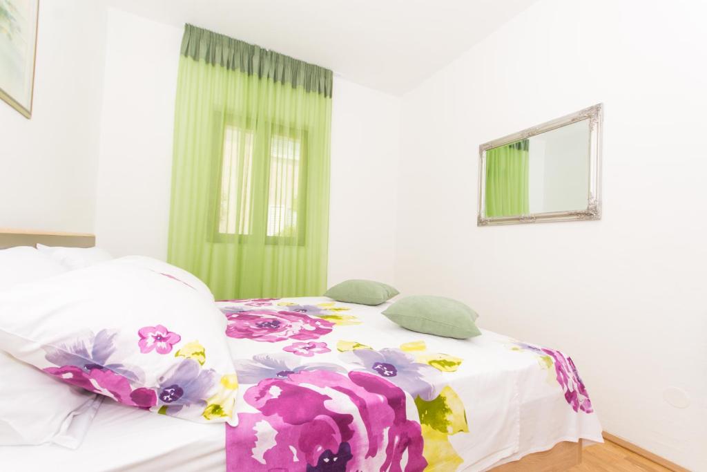 Posteľ alebo postele v izbe v ubytovaní Holiday home Ruzmarin