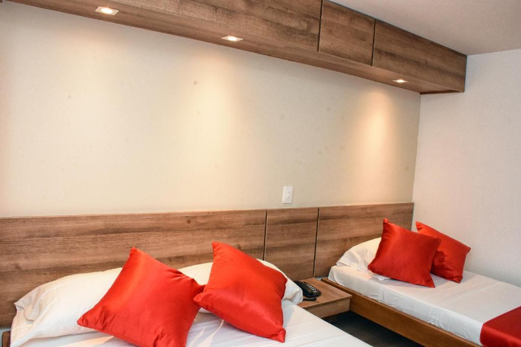 Postel nebo postele na pokoji v ubytování Hotel El Lago 1