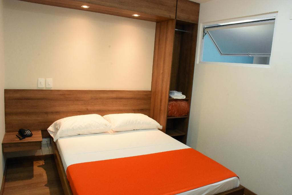 Postel nebo postele na pokoji v ubytování Hotel El Lago 1