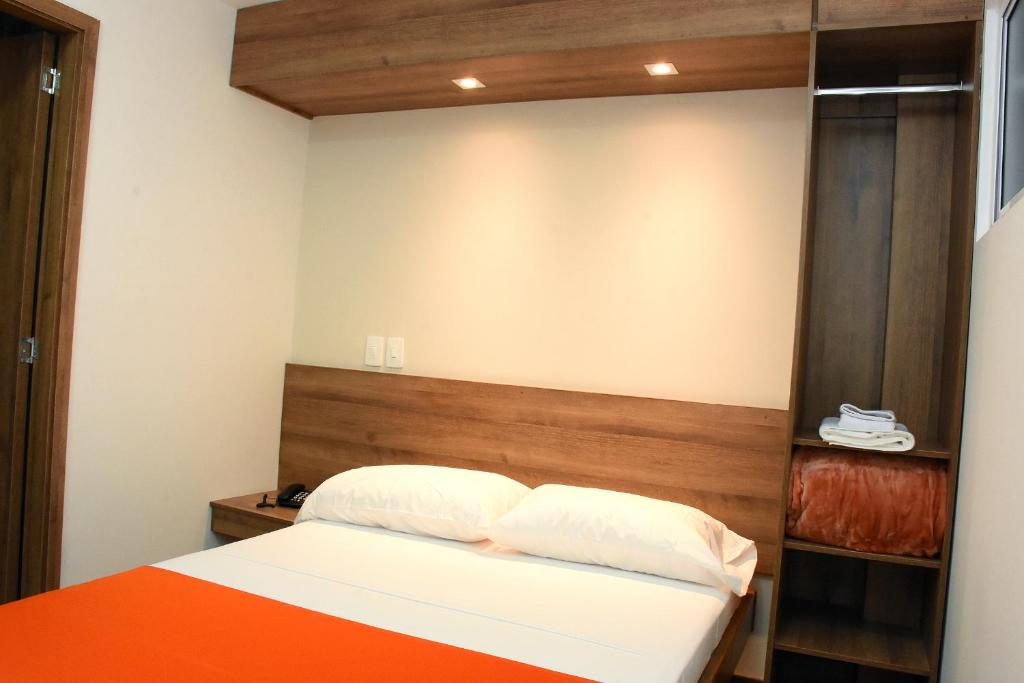 Postel nebo postele na pokoji v ubytování Hotel El Lago 1