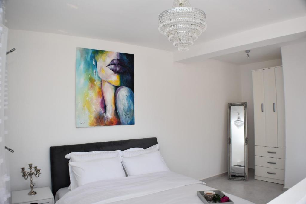 Ένα ή περισσότερα κρεβάτια σε δωμάτιο στο Apartmani Ognjanovic Kotor