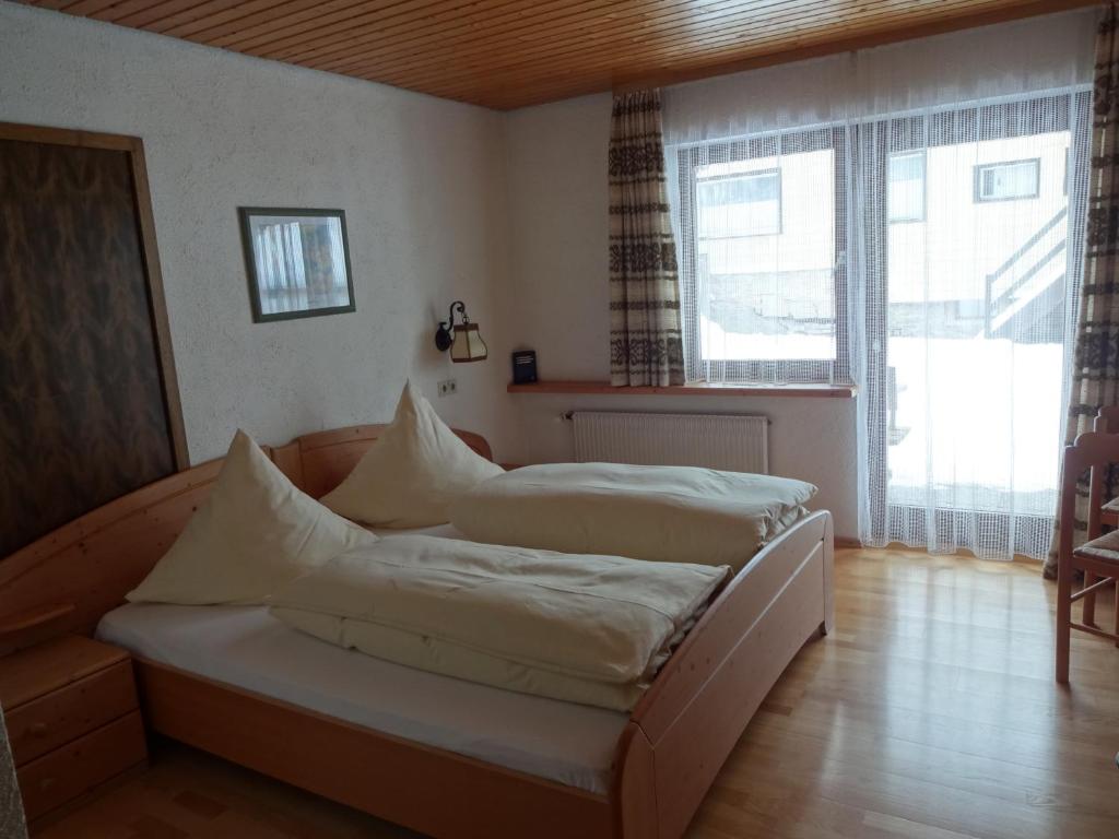 Postel nebo postele na pokoji v ubytování Hochschwarzwald-Hof