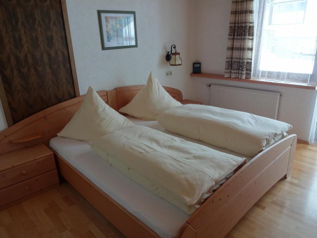 Postel nebo postele na pokoji v ubytování Hochschwarzwald-Hof