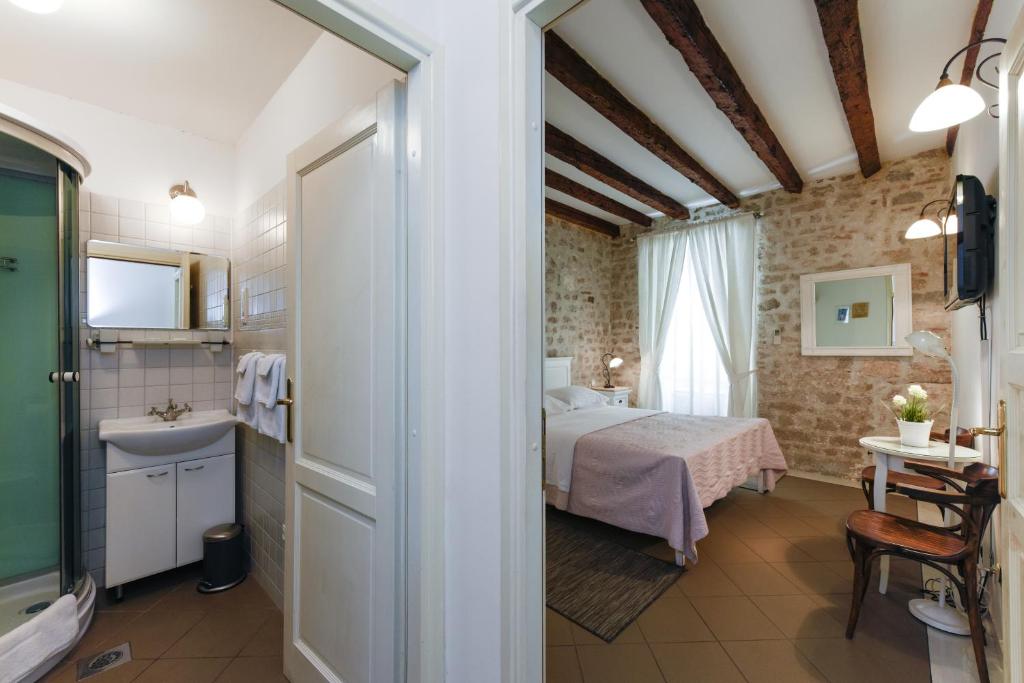 Posteľ alebo postele v izbe v ubytovaní Accomodation Gina