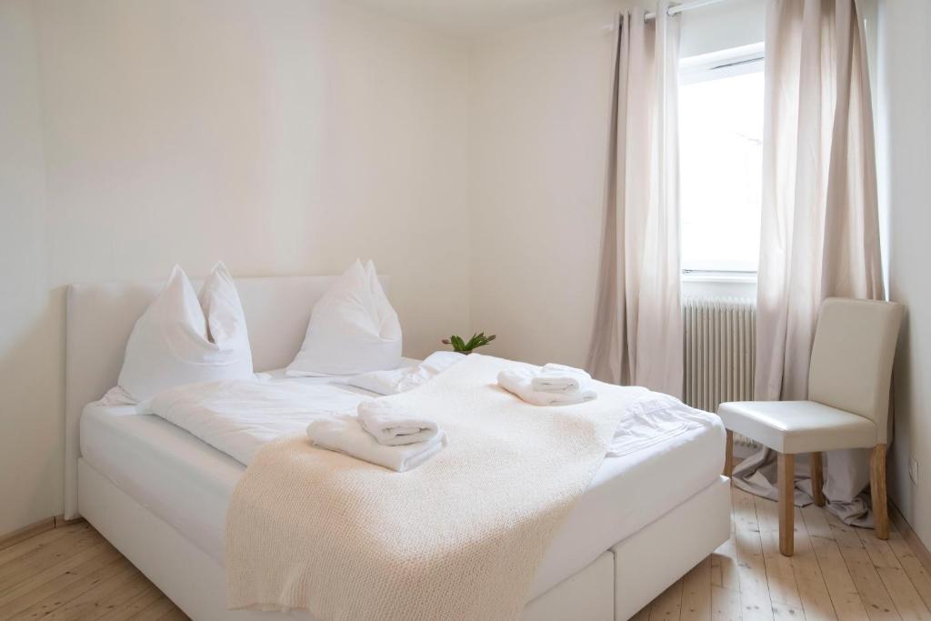 Posteľ alebo postele v izbe v ubytovaní Chalet Happy Family, secluded location, 15 min to salzburg and just short to t lakes sound of music, BBQ&bikes&sunbeds for free, up to 14p