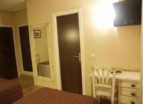 TV a/nebo společenská místnost v ubytování HOSTAL-CAFE GUTGRECO