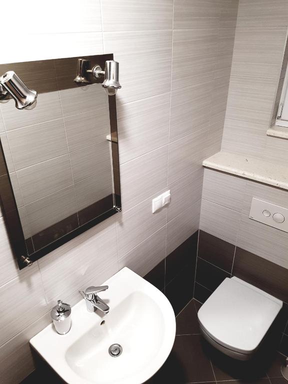 Kúpeľňa v ubytovaní Apartments Kalajica