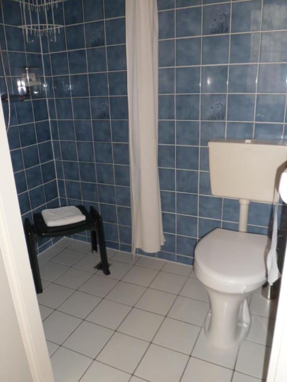 Koupelna v ubytování Staten Hotel