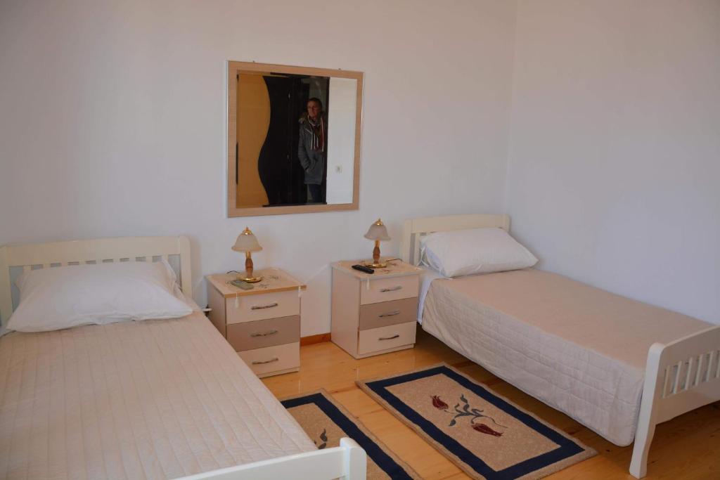 Postel nebo postele na pokoji v ubytování Guest house Memushi