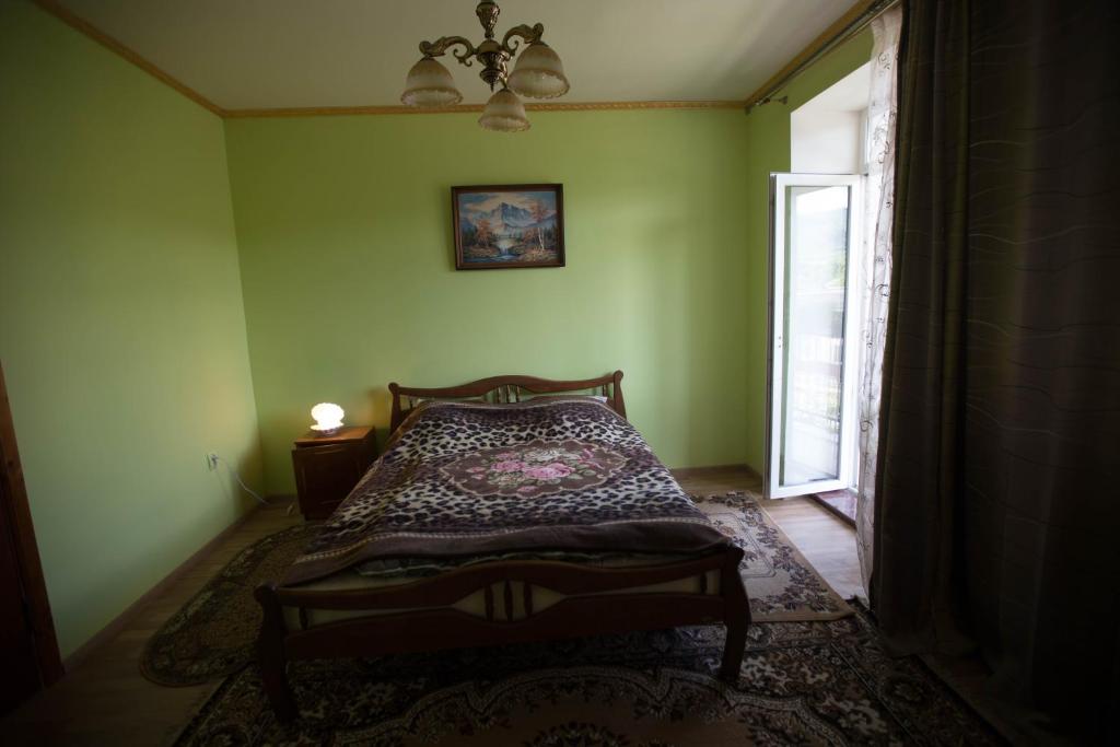 Postel nebo postele na pokoji v ubytování Guest House in Drachino