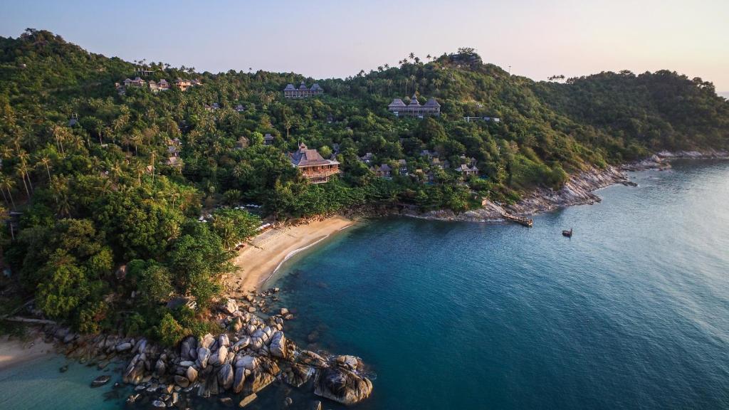 an aerial view of an island in the ocean at Santhiya Koh Phangan Resort and Spa in Thong Nai Pan Noi