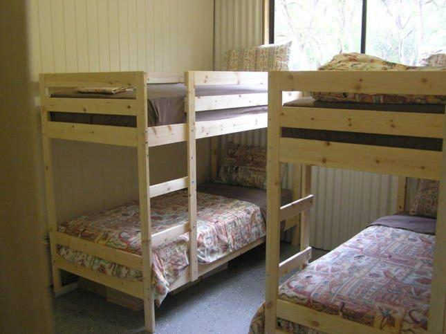 A bunk bed or bunk beds in a room at Hakuna Matata