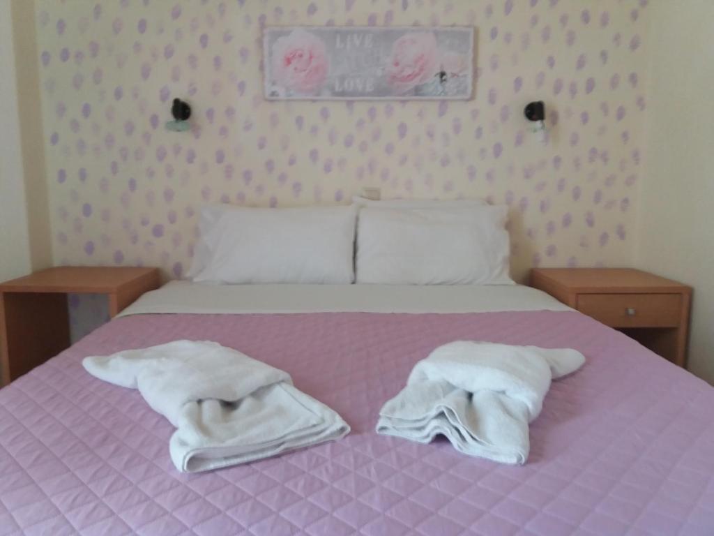 Postel nebo postele na pokoji v ubytování Lia Sofia Apartments
