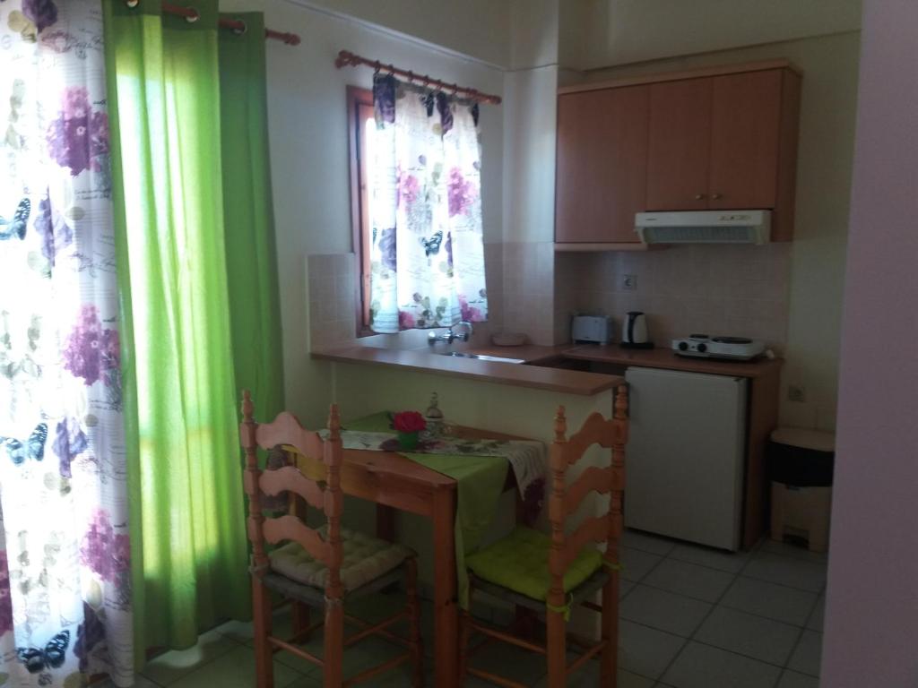 Kuchyň nebo kuchyňský kout v ubytování Lia Sofia Apartments