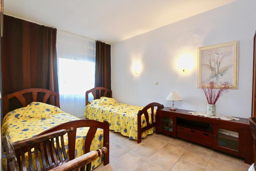 Postel nebo postele na pokoji v ubytování Villa in Maryvilla