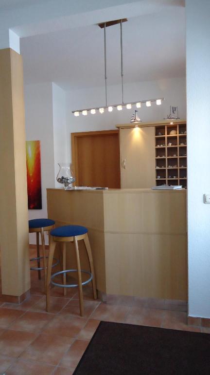 Kuchyň nebo kuchyňský kout v ubytování Hotel Garni Meeresgruß